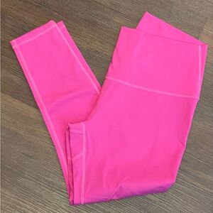 Hot Pink Zyia cropped leggings with cutouts on calves